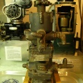 A vintage Woodward aircraft engine governor with a hydraulic oil pump attached